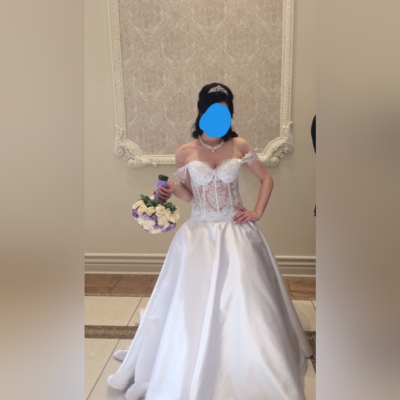 A white wedding gown. - Picture 2 of 3